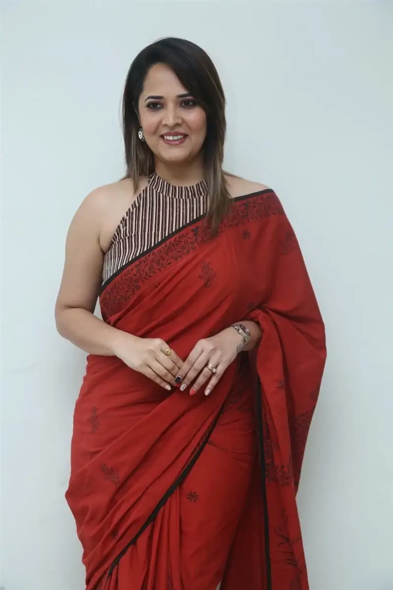 Hyderabad Girl Anasuya Bharadwaj in Red Saree at Movie Press Meet